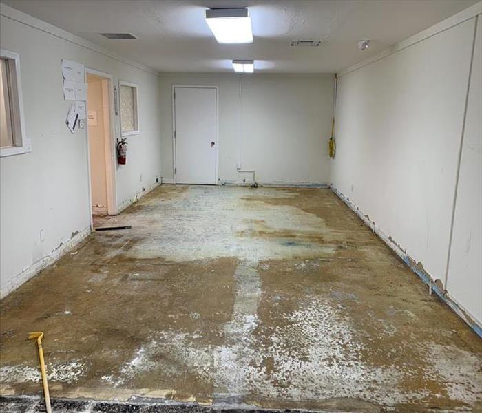 Office space with cubicles and flooring removed