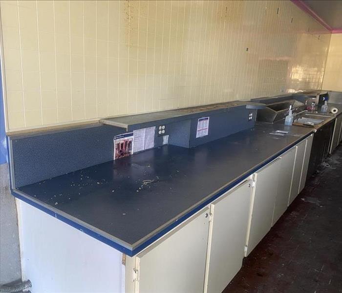 Countertops and cabinets in a food retail business affected by fire