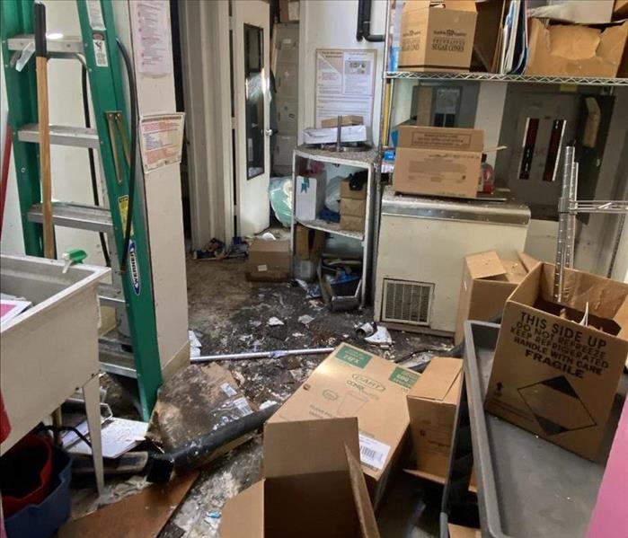 Back stock room trashed during fire fighting efforts at a business