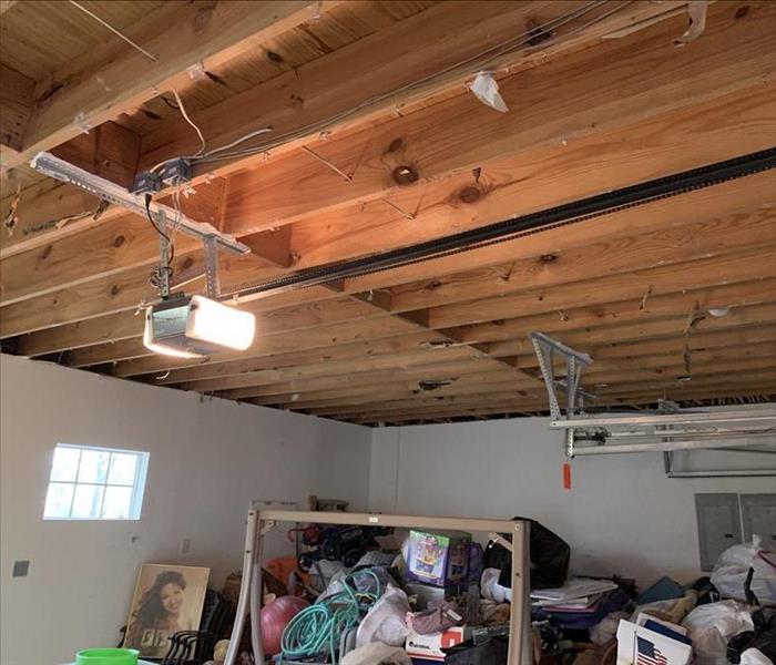 Garage with ceiling removed and contents moved