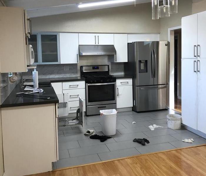 Kitchen affected by water from water filtration unit